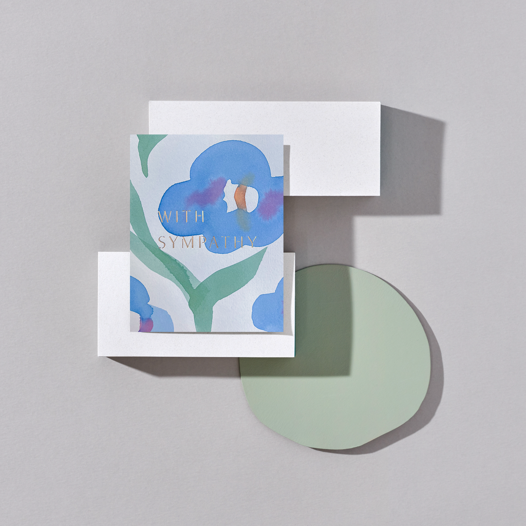 Greeting card with floral design and text on a gray background